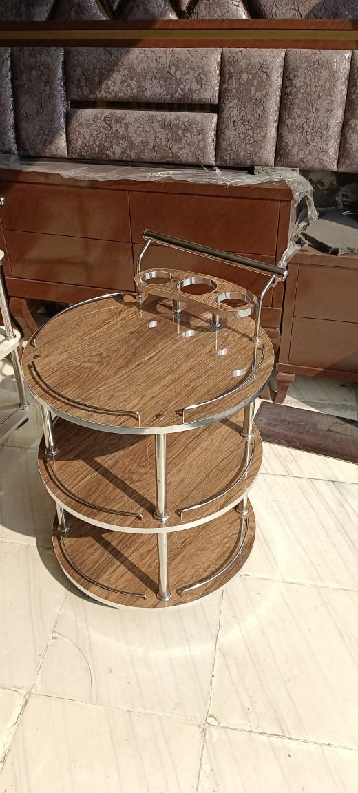 Featuring a pristine ivory high gloss UV wood finish, this trolley brings a touch of elegance and brightness to any space. Ideal for modern interiors seeking a clean and sophisticated look.