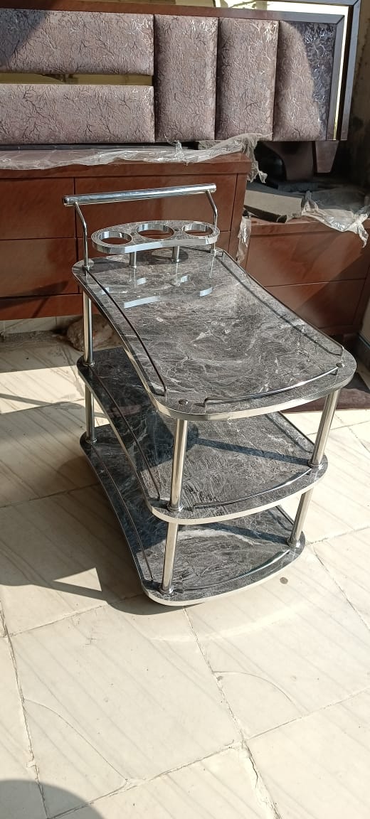 Boasting a subtle granite grey high gloss UV wood finish, this trolley variant offers a balanced and neutral tone, making it versatile for a variety of interiors from minimalist to urban chic.