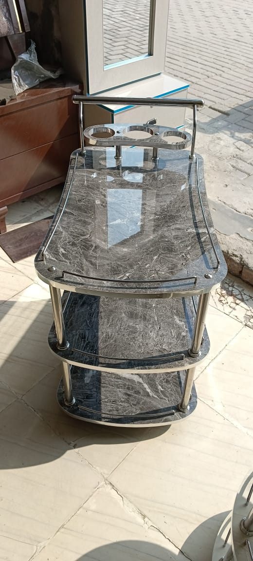 Boasting a subtle granite grey high gloss UV wood finish, this trolley variant offers a balanced and neutral tone, making it versatile for a variety of interiors from minimalist to urban chic.